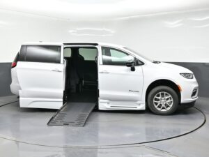White Chrysler Pacifica with BraunAbility Side Entry Automatic Fold Out conversion