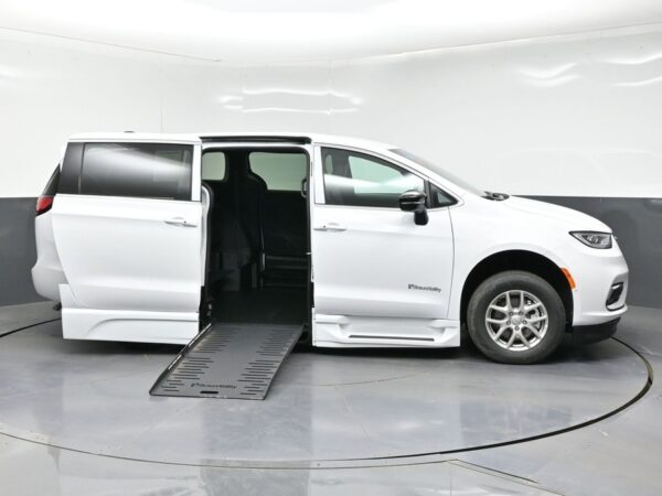 White Chrysler Pacifica with BraunAbility Side Entry Automatic Fold Out conversion