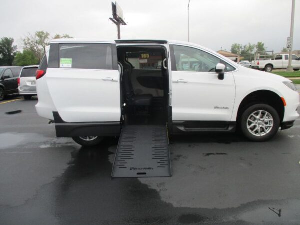 White Chrysler Voyager with BraunAbility Side Entry Automatic Fold Out conversion