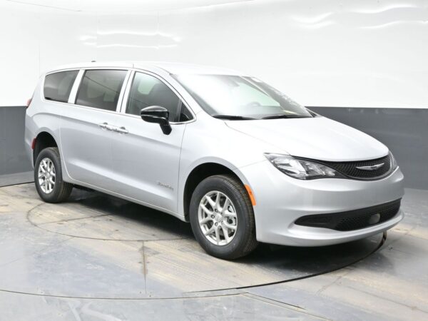 Silver Chrysler Voyager with BraunAbility Rear Entry Manual Fold Out conversion