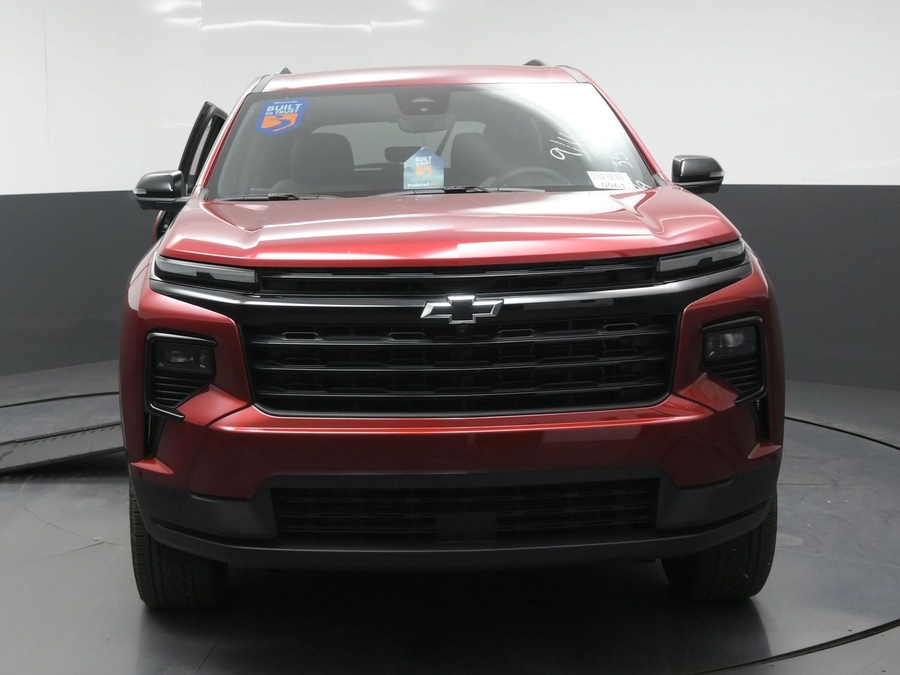 Red Chevrolet Traverse with BraunAbility Side Entry Automatic In Floor conversion
