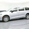 Silver Chrysler Voyager with BraunAbility Rear Entry Manual Fold Out conversion