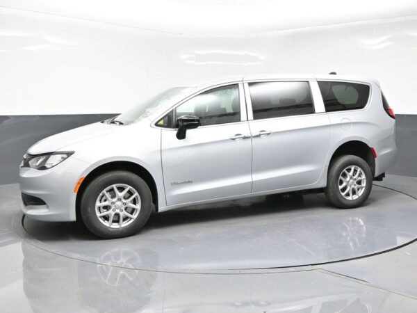 Silver Chrysler Voyager with BraunAbility Rear Entry Manual Fold Out conversion