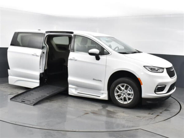 White Chrysler Pacifica with BraunAbility Side Entry Automatic Fold Out conversion