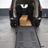 Black Chrysler Voyager with BraunAbility Rear Entry Manual Fold Out conversion