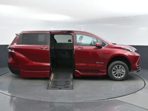 Red Toyota Sienna with BraunAbility Side Entry Automatic Fold Out conversion