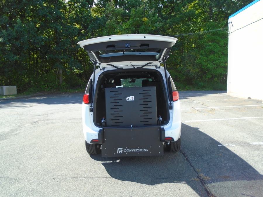 White Chrysler Pacifica with FR Conversions Rear Entry Manual Fold Out conversion