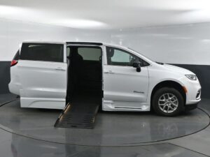 White Chrysler Pacifica with BraunAbility Side Entry Automatic Fold Out conversion