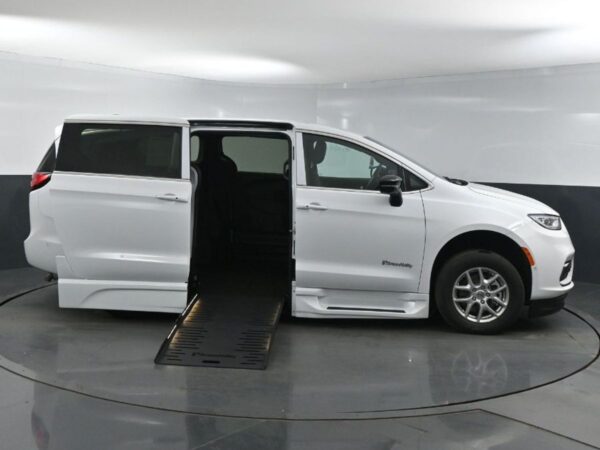 White Chrysler Pacifica with BraunAbility Side Entry Automatic Fold Out conversion