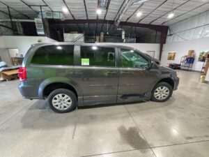 Grey Dodge Grand Caravan with BraunAbility Side Entry Automatic Fold Out conversion