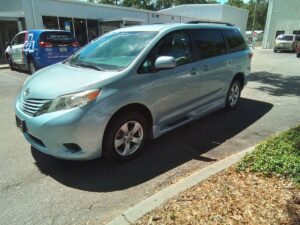 Blue Toyota Sienna with BraunAbility Side Entry Automatic Fold Out conversion