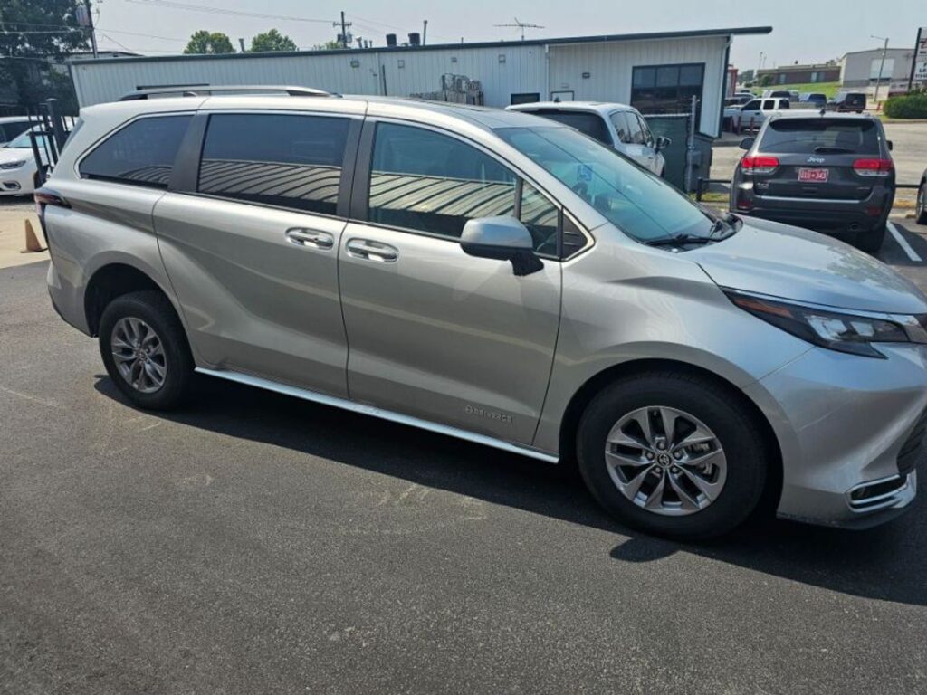 Silver Toyota Sienna with Driverge Rear Entry Manual Fold Out conversion