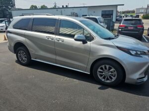 Silver Toyota Sienna with Driverge Rear Entry Manual Fold Out conversion