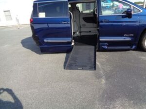 Blue Chrysler Pacifica with BraunAbility Side Entry Automatic Fold Out conversion