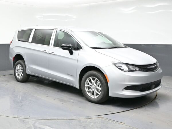 Silver Chrysler Voyager with BraunAbility Rear Entry Manual Fold Out conversion