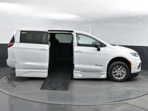 White Chrysler Pacifica with BraunAbility Side Entry Automatic Fold Out conversion