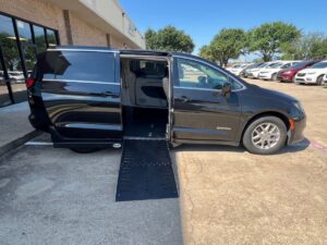Black Chrysler Voyager with Driverge Side Entry Automatic Fold Out conversion