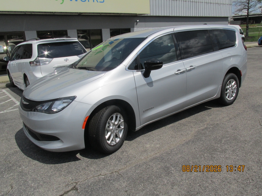 Silver Chrysler Voyager with Driverge Side Entry Automatic Fold Out conversion