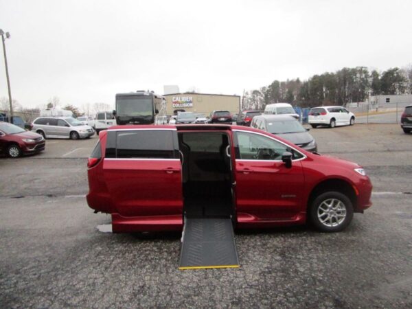 Red Chrysler Pacifica with Driverge Side Entry Automatic Fold Out conversion