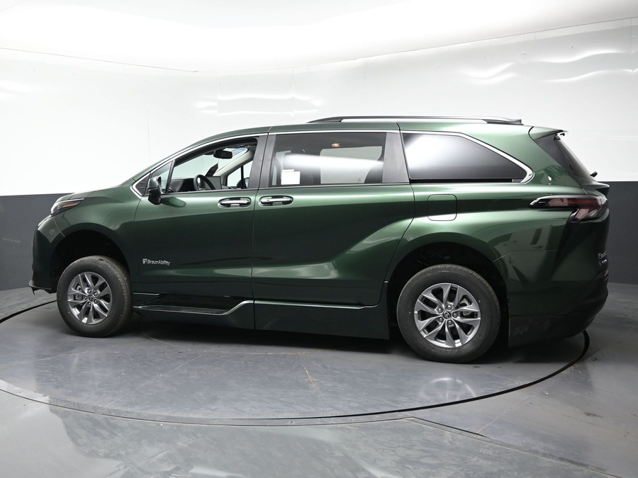 Green Toyota Sienna with BraunAbility Side Entry Automatic Fold Out conversion