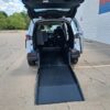 White Toyota Sienna with Driverge Rear Entry Manual Fold Out conversion