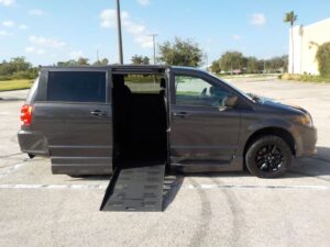 Grey Dodge Grand Caravan with BraunAbility Side Entry Automatic Fold Out conversion