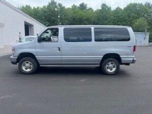 Silver Ford Econoline with Norcal Side Entry Automatic Fold Out conversion