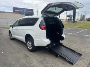 White Chrysler Pacifica with FR Conversions Rear Entry Manual Fold Out conversion