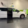White Chrysler Pacifica with Driverge Side Entry Automatic Fold Out conversion