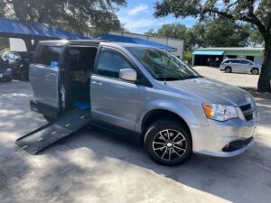 White Dodge Grand Caravan with BraunAbility Side Entry Manual Fold Out conversion