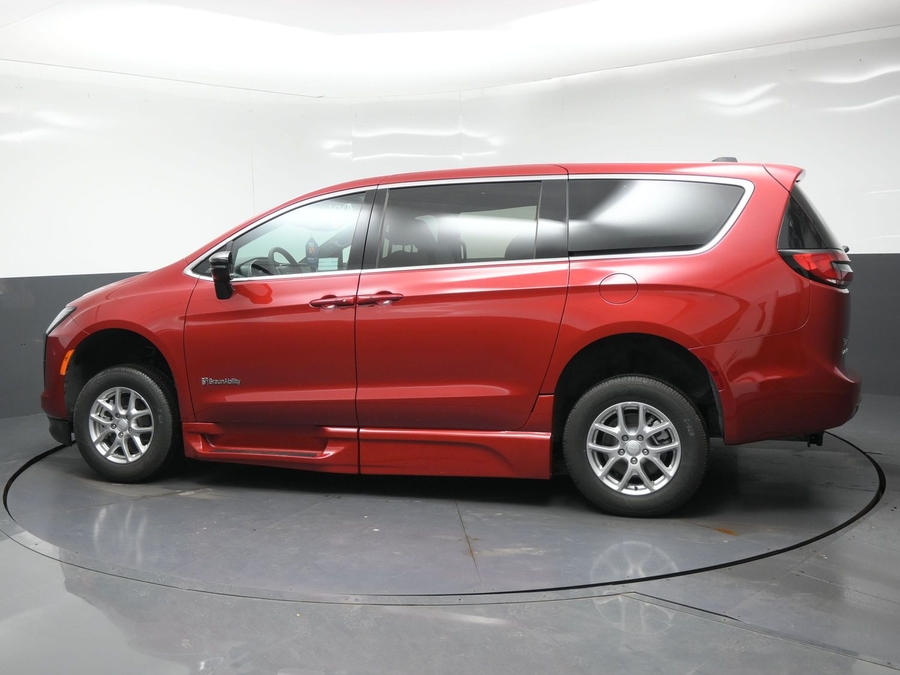 Red Chrysler Pacifica with BraunAbility Side Entry Automatic Fold Out conversion