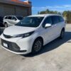 White Toyota Sienna with Driverge Rear Entry Manual Fold Out conversion