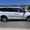 White Chrysler Voyager with FR Conversions Rear Entry Manual Fold Out conversion