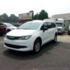 White Chrysler Voyager with FR Conversions Rear Entry Manual Fold Out conversion
