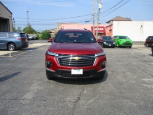 Red Chevrolet Traverse with BraunAbility Side Entry Automatic In Floor conversion