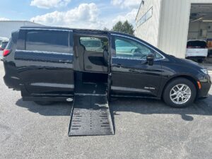 Black Chrysler Pacifica with Driverge Side Entry Automatic Fold Out conversion