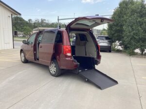 Red Dodge Grand Caravan with Other Rear Entry Manual Fold Out conversion