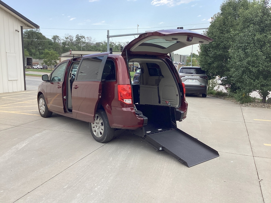 Red Dodge Grand Caravan with Other Rear Entry Manual Fold Out conversion