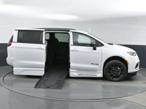 White Chrysler Pacifica with BraunAbility Side Entry Automatic Fold Out conversion