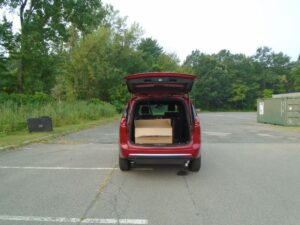 Red Chrysler Pacifica with BraunAbility Side Entry Automatic Fold Out conversion