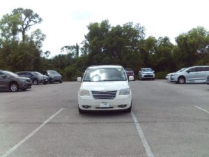 White Chrysler Town and Country with BraunAbility Side Entry Automatic Fold Out conversion