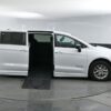 White Chrysler Pacifica with BraunAbility Side Entry Automatic Fold Out conversion
