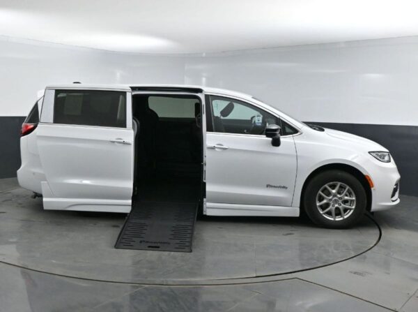 White Chrysler Pacifica with BraunAbility Side Entry Automatic Fold Out conversion