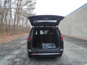 Black Chrysler Pacifica with Driverge Side Entry Automatic Fold Out conversion