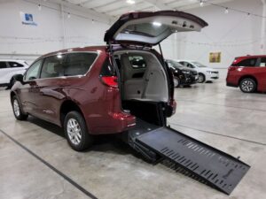 Red Chrysler Pacifica with BraunAbility Side Entry Automatic Fold Out conversion