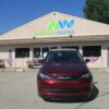 Red Chrysler Voyager with BraunAbility Side Entry Automatic Fold Out conversion