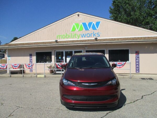 Red Chrysler Voyager with BraunAbility Side Entry Automatic Fold Out conversion