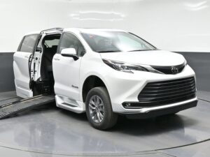 White Toyota Sienna with BraunAbility Side Entry Automatic Fold Out conversion