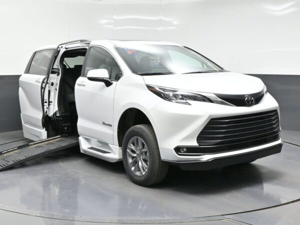 White Toyota Sienna with BraunAbility Side Entry Automatic Fold Out conversion