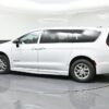 White Chrysler Pacifica with BraunAbility Side Entry Automatic Fold Out conversion